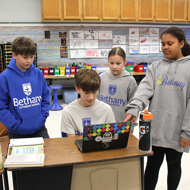 Picture of students learning in the classroom.